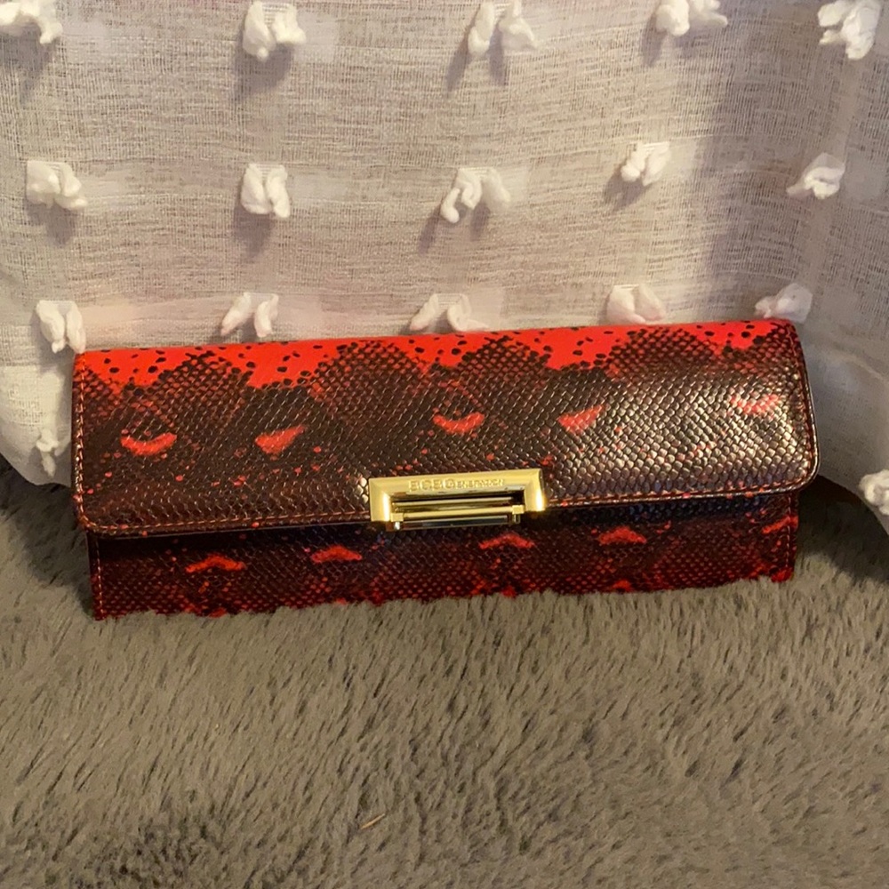 BCBGeneration Clutch red & black snake